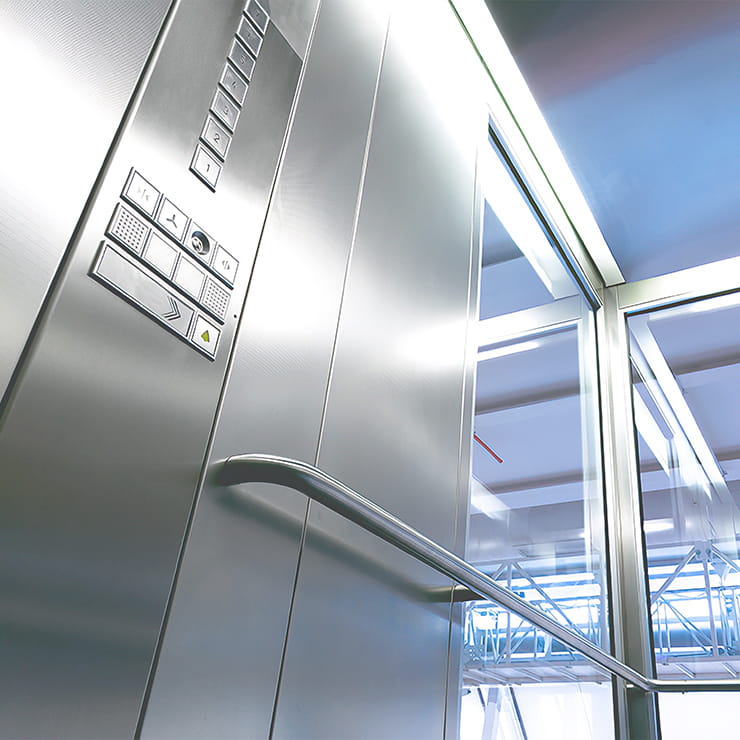 Elevator buttons and handrail for high-touch surface cleaning services in Renton WA